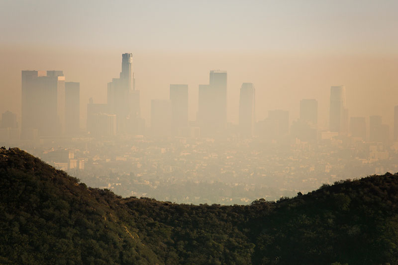 City skyline viewed through a haze of air pollution.