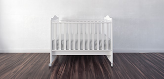 Empty infant crib.