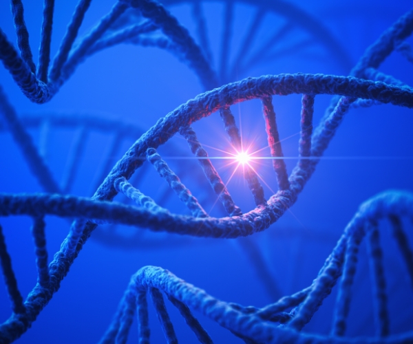 Three dimensional DNA strands in a double helix are blue against blue background. In the center is a bright sun-like dot.