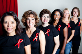 Women wearing AIDS ribbon