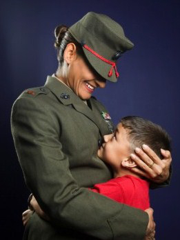 Military mother holding son