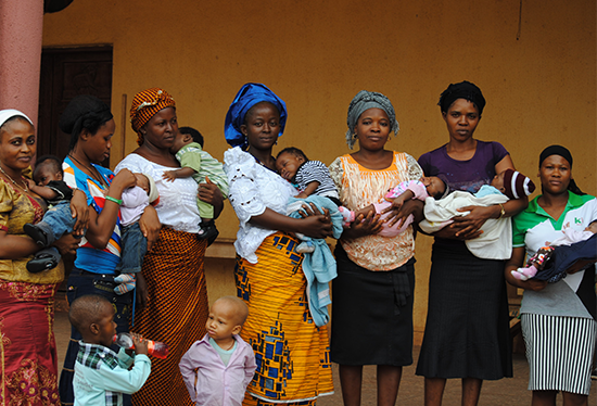 Pregnant women and their children  outside their church in Nigeria. Credit: Dina Patel, Healthy Sunrise  Foundation